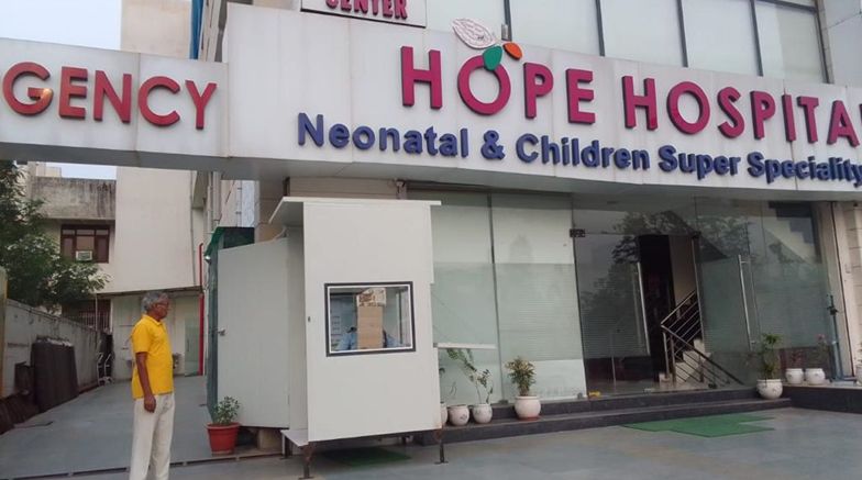 A readymade guard room from pronto with a window, door installed in front of Hope Hospital